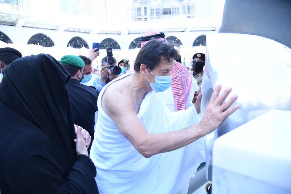 Pakistani PM Imran Khan is seen while approaching Ḥajaru al-Aswad which was set intact into the Kaaba's wall by the Prophet Muhammad.