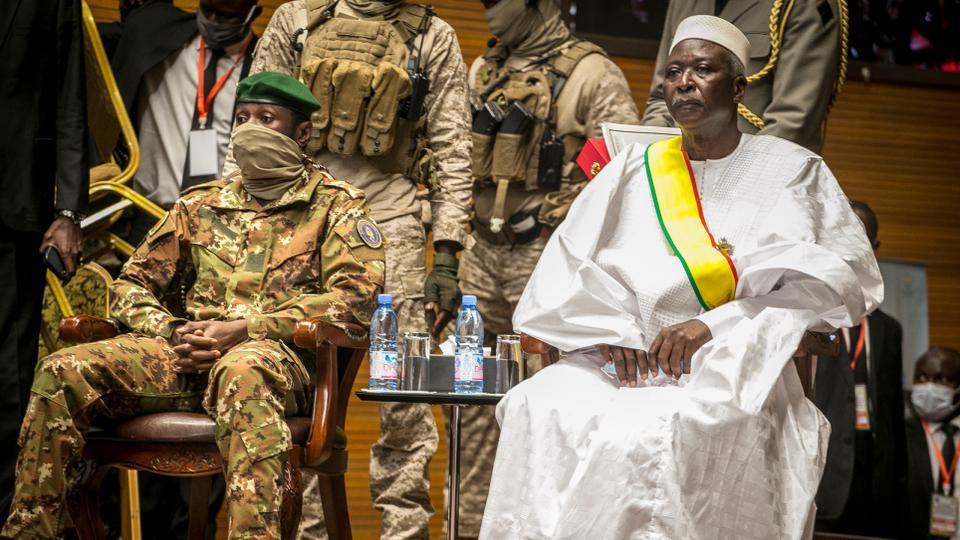 Mali's Interim President Bah Ndaw (R) is seen with Interim Vice President Colonel Assimi Goita (L) during Ndaw's inauguration ceremony in Bamako on September 25, 2020.