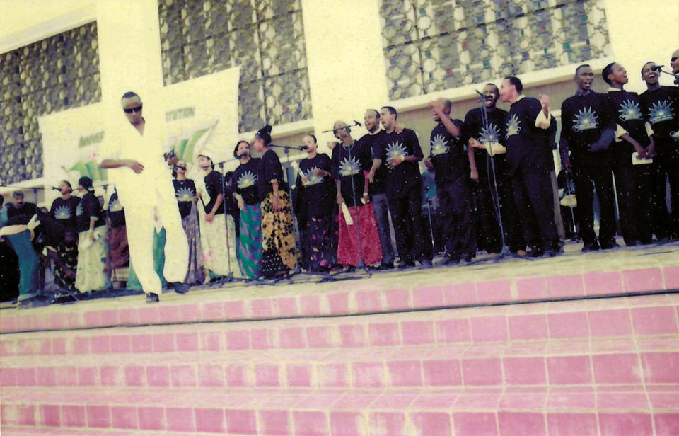 4 Mars performing on the steps of Djibouti's national theatre in the early 1990s. The 40-member supergroup was seen as a vehicle to promote messages of unity, self-sufficiency, and identity following the country's independence in 1977.