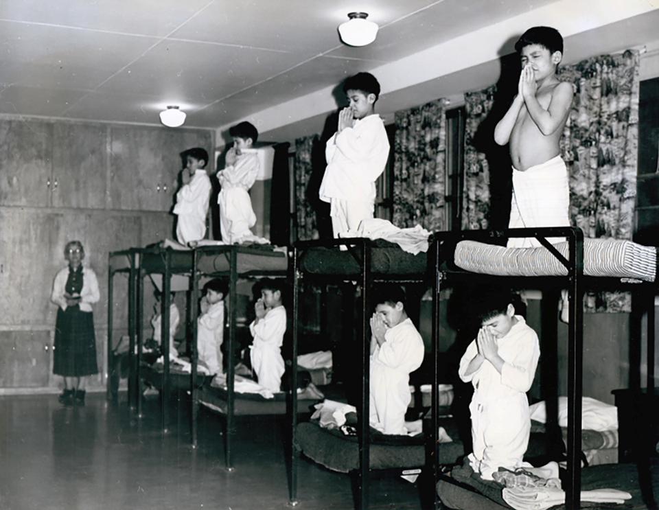 Canada's residential school system aimed to assimilate Indigenous children. The picture is from the Bishop Horden Memorial School, a residential school in the indigenous Cree community of Moose Factory, Ontario, Canada in 1950.