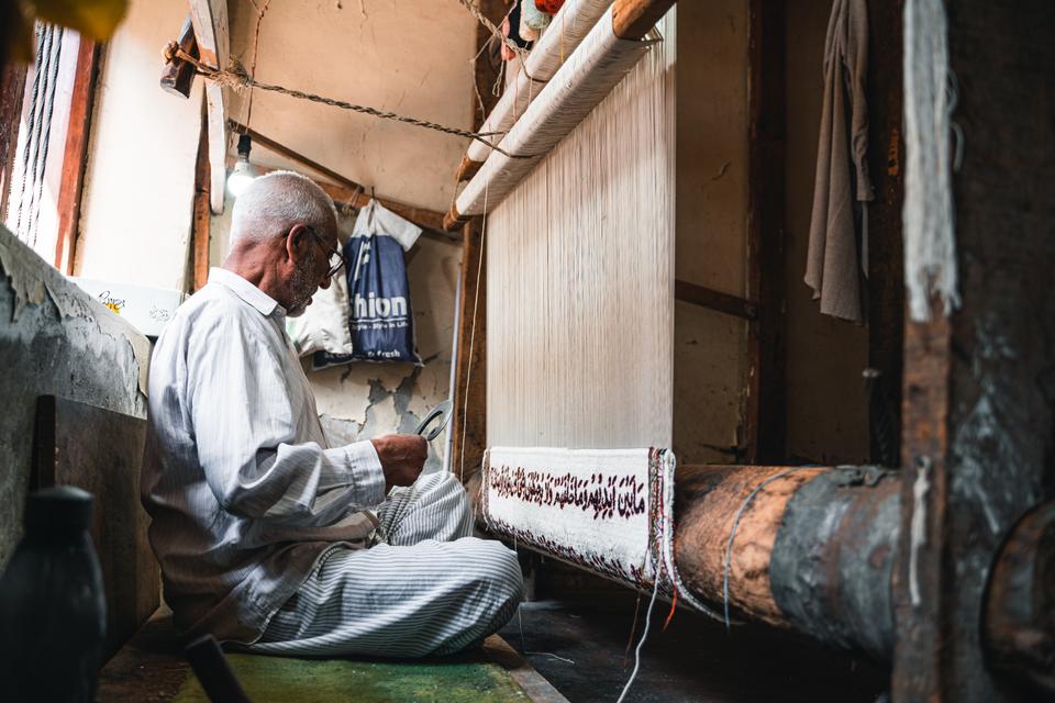 Ghulam Nabi is one of the few remaining craftsmen who has mastered the art of designing and weaving carpets.