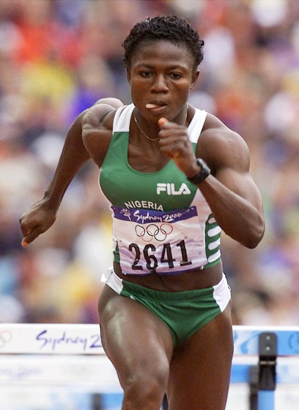 Gloria Alozi era uma das maiores esperanças da Nigéria pela medalha até 2000, ano em que circunstâncias difíceis a forçaram a deixar a Nigéria e competir pela Espanha.