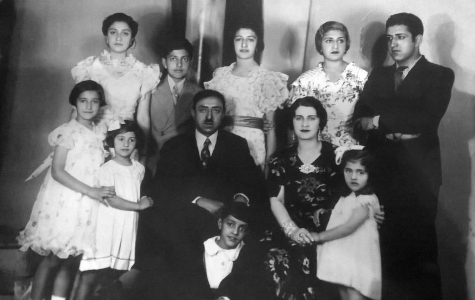 Amanullah Khan and his family, Rome, 1933. From left to right, respectively: Abeda, Rahmatullah, Meliha, Amina, Hedayatullah, Adela, India, Amanullah Khan, Soraya Tarzi, Naciye, Ehsanullah.