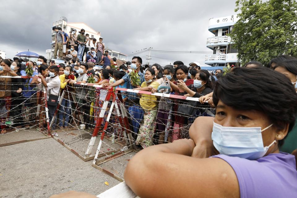 Families wait outside Insein prison after Myanmar's authorities announced to free around 700 prisoners in Yangon, Myanmar June 30, 2021.