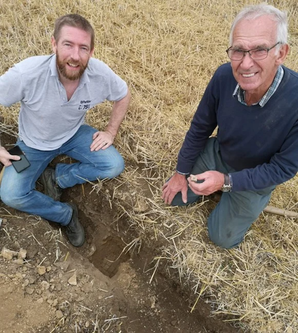Jim Irvine and Brian Naylor pictured first discovering the Roman mosaic in their field during the 2020 lockdown.