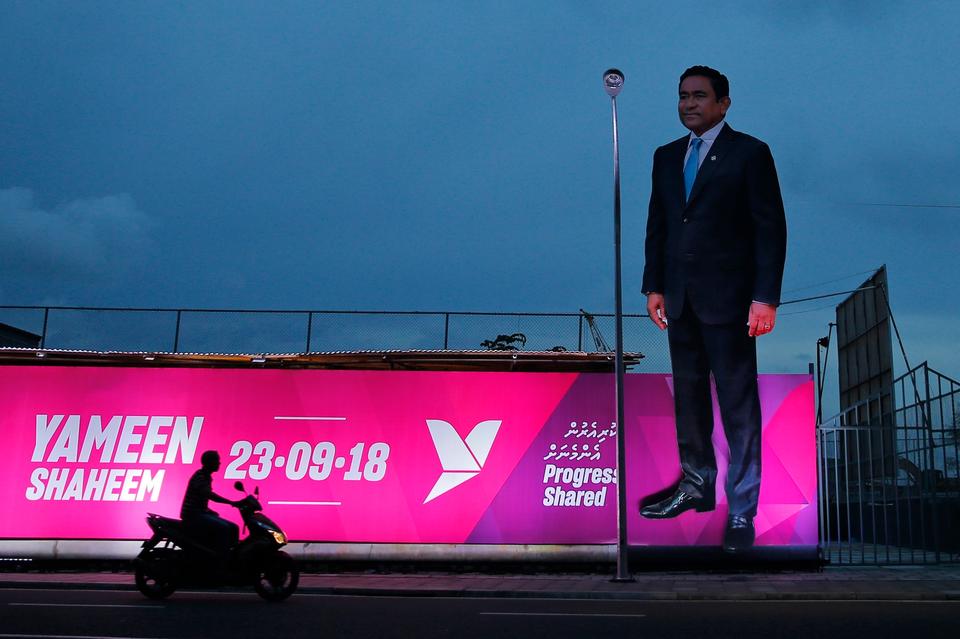 A giant cut-out of former Maldivian President Yameen Abdul Gayoom stands on a road ahead of elections in Male, Maldives, in 2018.