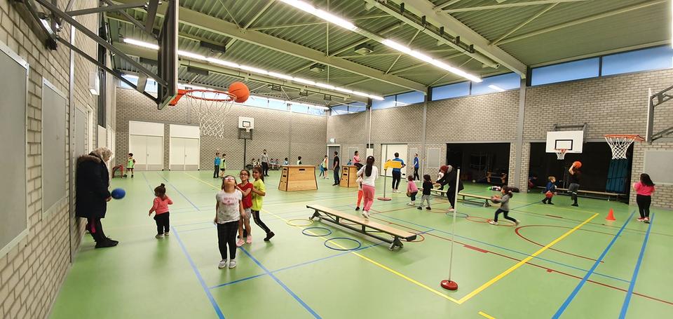 Nadya volunteer's at her children's sports classes.