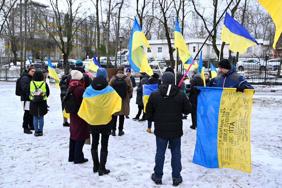 Protesters gather during a rally against Russia's attacks on Ukraine in front of the Russian embassy in Stockholm, Sweden February.