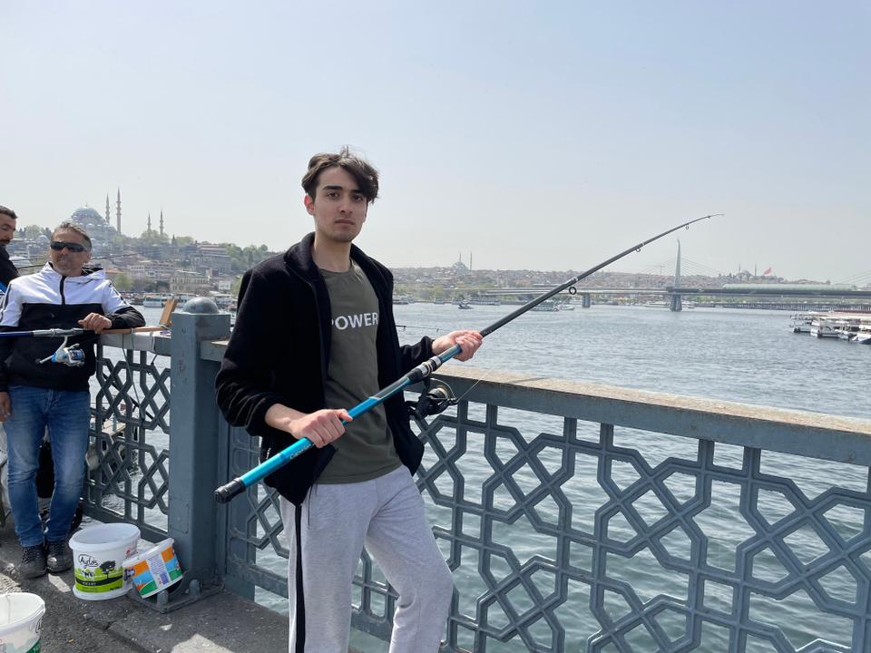 Most amateur fishermen are in their 60s, but sometimes the younger generation is also represented at the Galata Bridge, such as Abdullah Konakci.