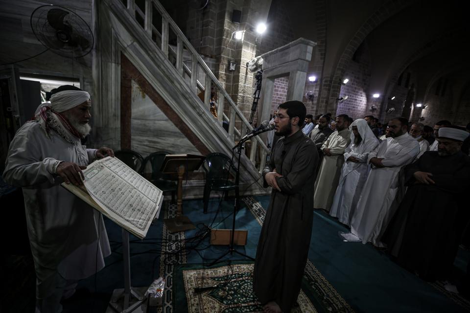 Muslims from the besieged Palestinian enclave of Gaza gather at the Omari Grand Mosque to perform prayer during Laylat al Qadr.