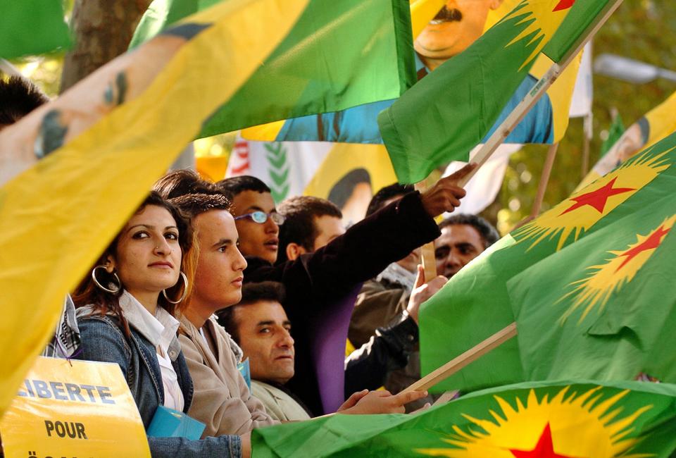 PKK supporters hold flags and portraits of Abdullah Ocalan, the leader of the terrorist group, as they demonstrate outside the Council of Europe in Strasbourg, France, 2007.