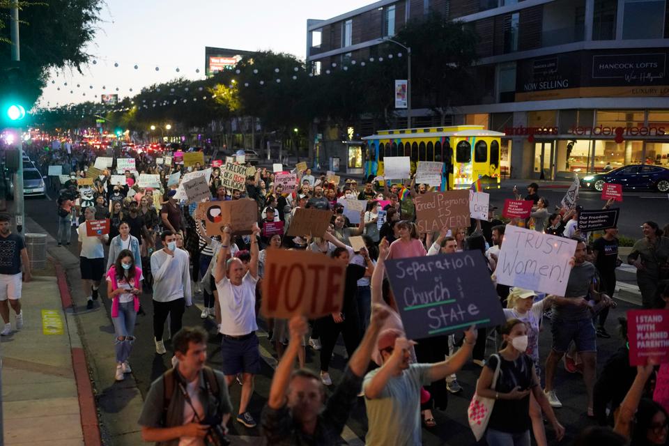 Supporters of abortion rights march along a street during a protest in West Hollywood, California.