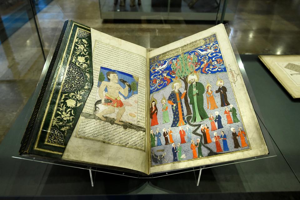 Zubdet’ut Tevarih (religious, Islam and Ottoman history), prepared for Sultan Murad III. Dated 993/1583. The open pages show a djinn with two fish in his hands, and the opposite page depicts Adam and Eve in the Garden of Eden.