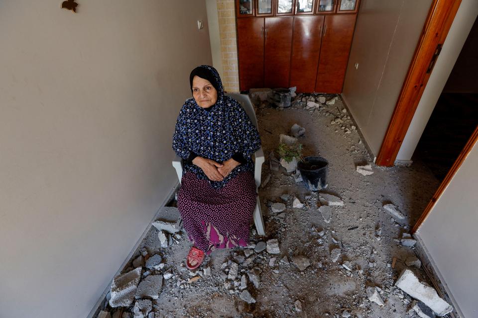 Shamalakh says her one-storey house was destroyed when an Israeli air strike hit a building next door belonging to a relative, who was warned to clear their house and to tell their neighbours to do the same.