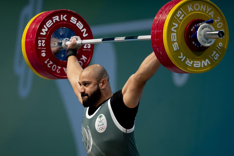 Alkhazal Ali Ahmed of Saudi Arabia competes in the men's weightlifting. — Anadolu Agency
