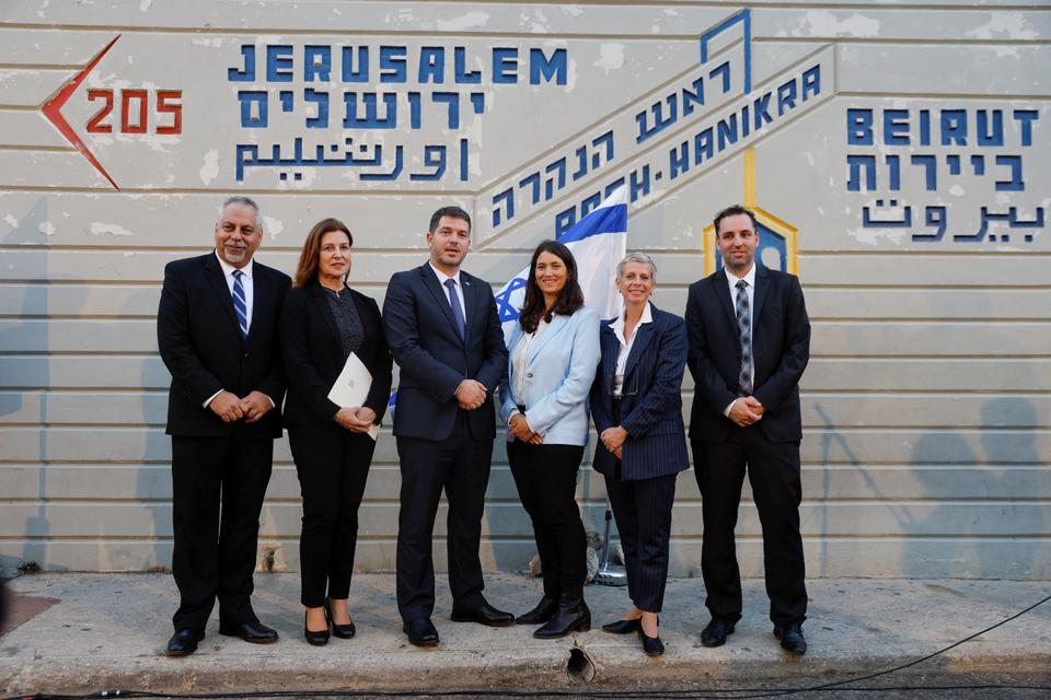 Israeli Energy Ministry Director General Lior Schillat stands for a photograph with the Israeli negotiation team, after the US-brokered deal setting a maritime border between Israel and Lebanon, in Rosh Hanikra, northern Israel October 27, 2022.