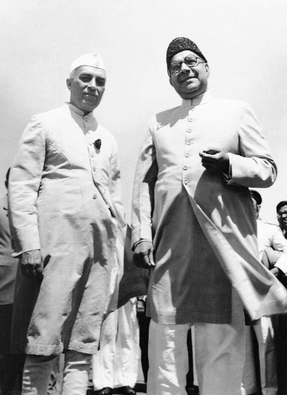 India Premier Jawaharlal Nehru, left, and Pakistan's first Prime Minister Liaquat Ali Khan, pose at Palam airport in Delhi, India, April 2, 1950.