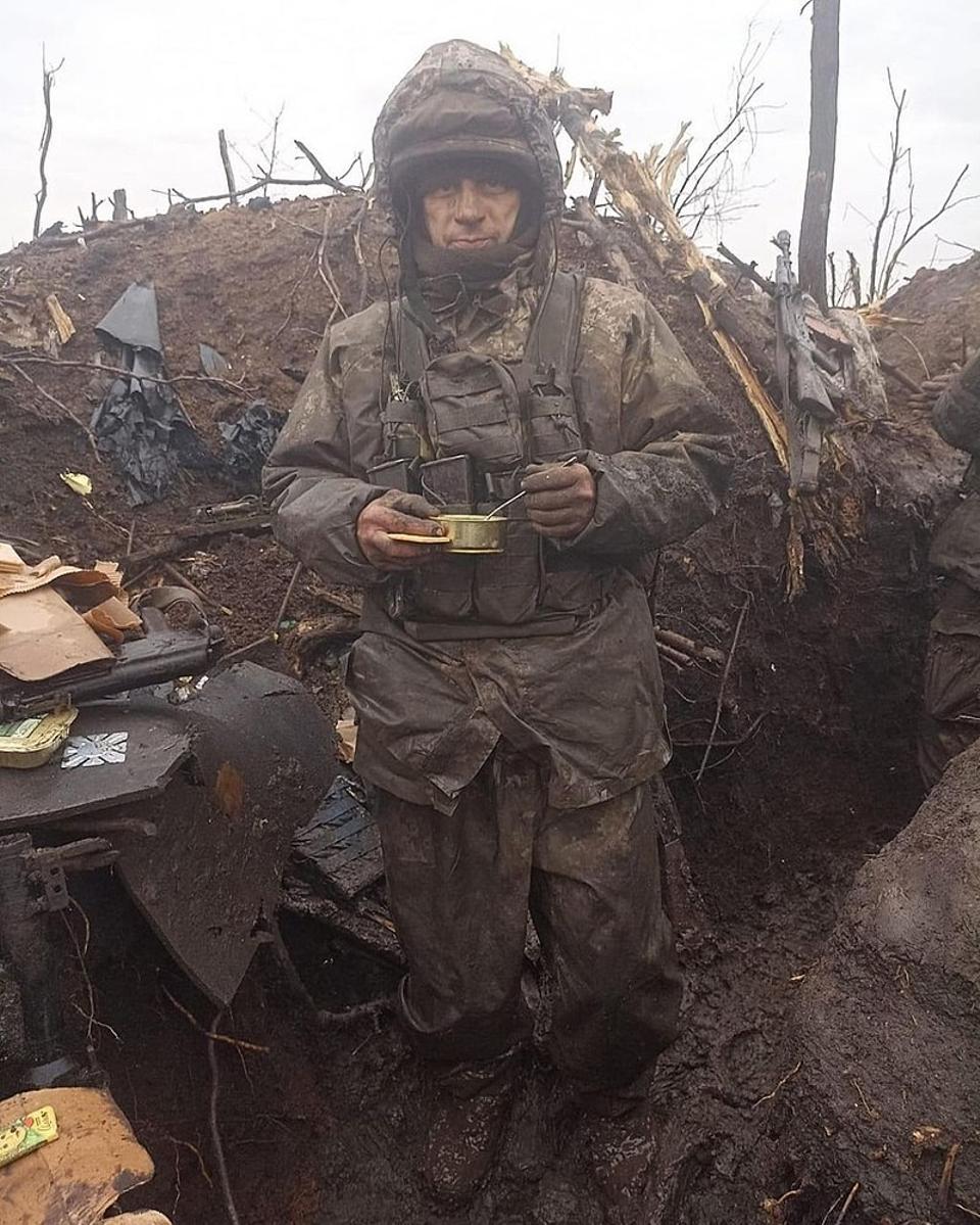 A Ukrainian soldier tries to survive in the trench-lines of Bakhmut in eastern Ukraine in November 2022.
