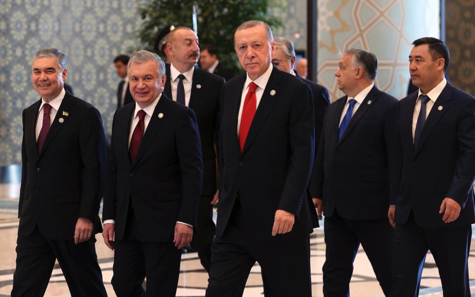 Turkmenistan's Chairman of the People's Council Gurbanguly Berdimuhamedow, Uzbek President Shavkat Mirziyoyev, Azerbaijani President Ilham Aliyev, Turkey's President Recep Tayyip Erdogan, Hungary's Prime Minister Viktor Orban and Kyrgyz President Sadyr Japarov, from left, arrive to the Organization of Turkic States summit in Samarkand, Uzbekistan, Friday, Nov. 11, 2022.