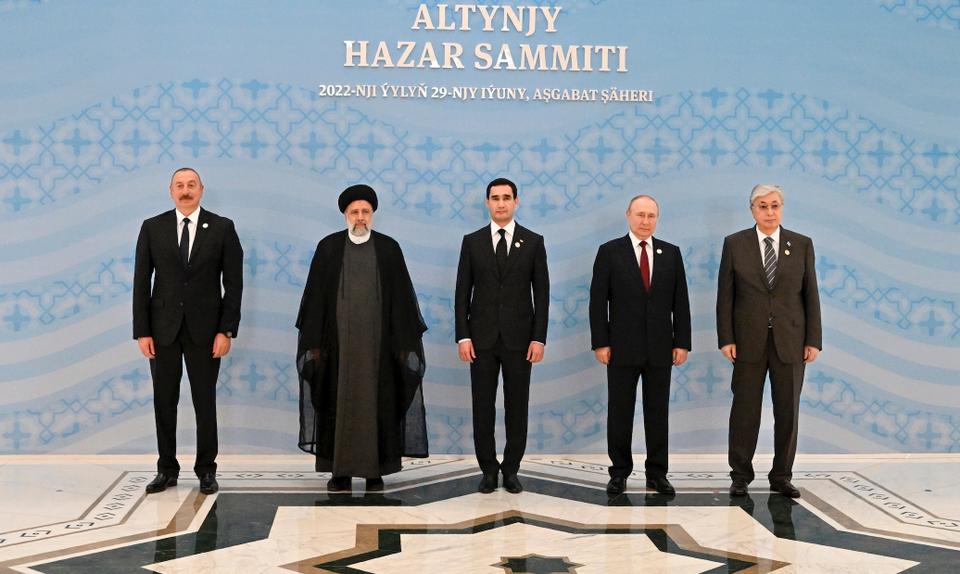 Azerbaijan's President Ilham Aliyev, Iran's President Ebrahim Raisi, Turkmenistan's President Serdar Berdymukhamedov, Russian President Vladimir Putin and Kazakhstan's President Kassym-Jomart Tokayev pose for a photo on the sideline of the summit of Caspian Sea littoral states in Ashgabat, Turkmenistan, Wednesday, June 29, 2022.