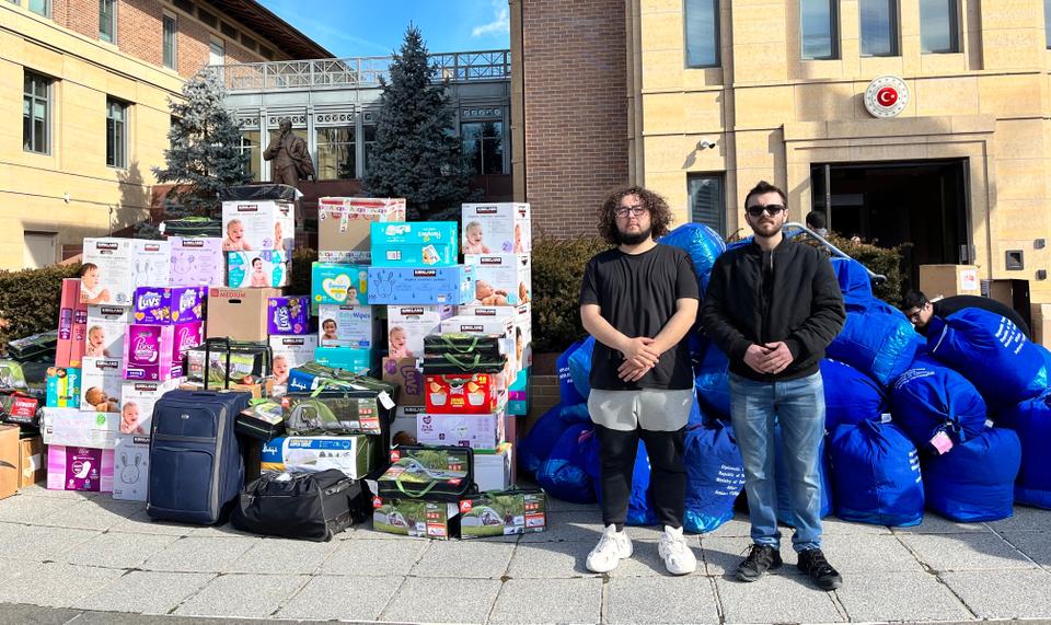 Ata Han Kasab Chopur (R) and his friend Alp Selman have been volunteering since the calls for aid were made by the Turkish embassy.