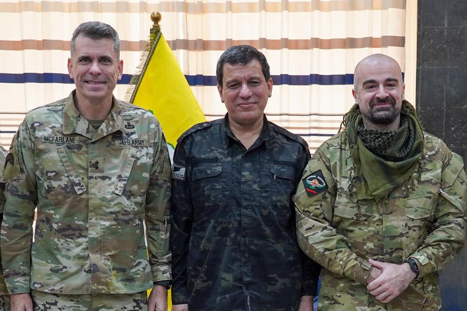 PUK head Bafel Talabani, on the left, met Mazlum Kobane, a leading PKK member, who is now the commander of the US-backed SDF in December in northeastern Syria. US Maj. Gen. Matthew W. McFarlane, the commander of Combined Joint Task Force – Operation Inherent Resolve, also participated in the meeting.