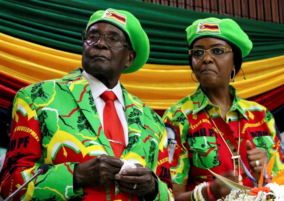 Zimbabwean President Robert Mugabe and his wife Grace attend a meeting of his ruling ZANU PF party's youth league in Harare, Zimbabwe, October 7, 2017