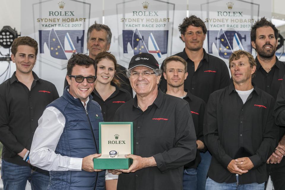 Jim Cooney (C), owner of Australian Supermaxi Comanche, and crew celebrating victory in the Sydney to Hobart yacht race in Hobart. Comanche was crowned line honours winner of the annual yacht race after Wild Oats XI was hit with a time penalty. December 28, 2017.
