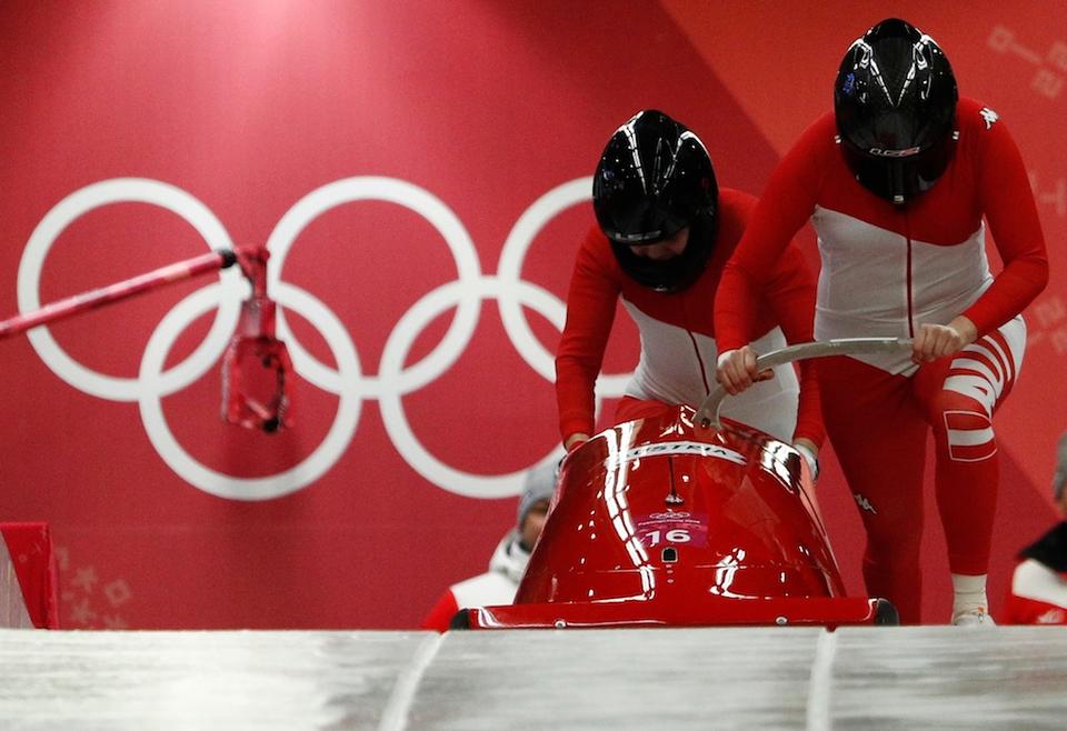Christina Hengster and Valerie Kleiser of Austria compete at the Olympic Sliding Centre in Pyeongchang, South Korea on February 20, 2018.