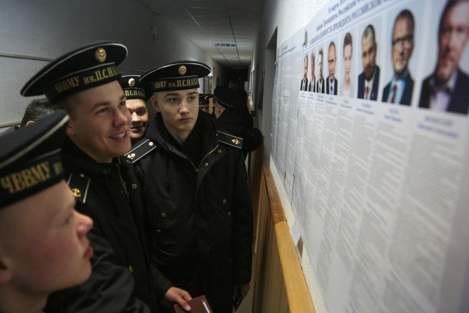 Cadets of the Nakhimov naval academy vote at a polling station during Russia's presidential election in Sevastopol, Crimea.