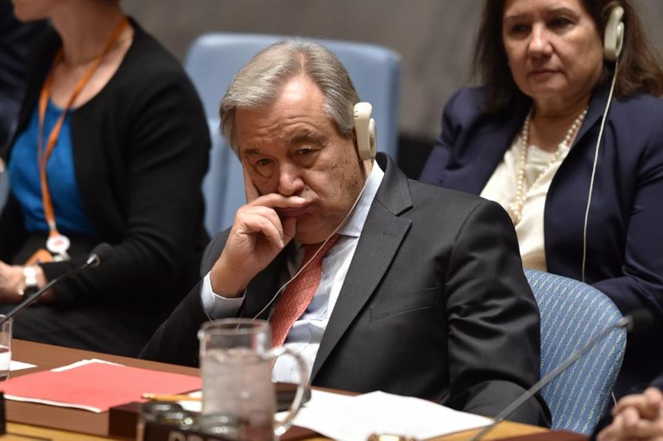 UN Secretary-General Antonio Guterres listens during a UN Security Council meeting in New York, on April 14, 2018.