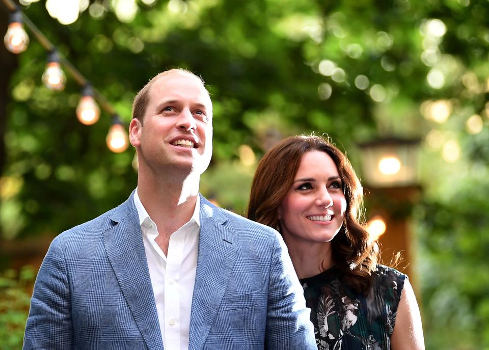 Britain's Prince William, the Duke of Cambridge and his wife Princess Kate, the Duchess of Cambridge, attend a reception at Claerchens Ballhaus, in Berlin Germany, on July 20, 2017.