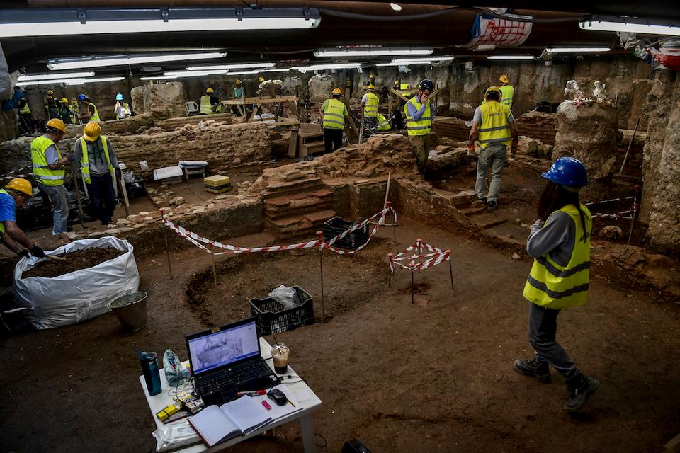Construction crews and archaeologists work on the excavation of an ancient site under the city centre of modern Thessaloniki, on April 25, 2018.