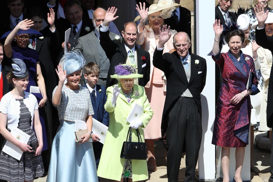 Queen Elizabeth II and other members of the royal family wave after the wedding of Prince Harry and Meghan Markle at St George's Chapel in Windsor Castle in Windsor, Britain, on May 19, 2018.