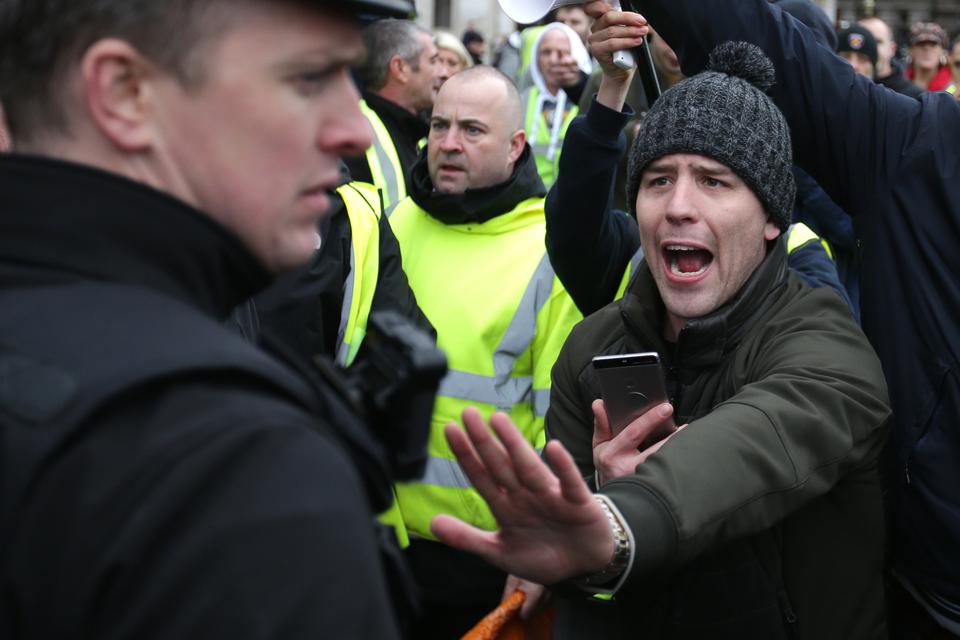 Pro-Brexit protesters confront police during a demonstration in central London on January 12, 2019.