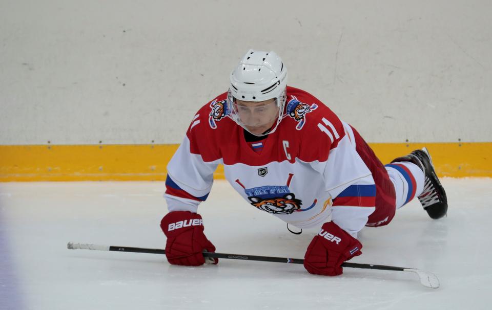 Russian President Vladimir Putin warms up before playing ice hockey at Shayba Arena in the Black Sea resort of Sochi, Russia February 15, 2019.