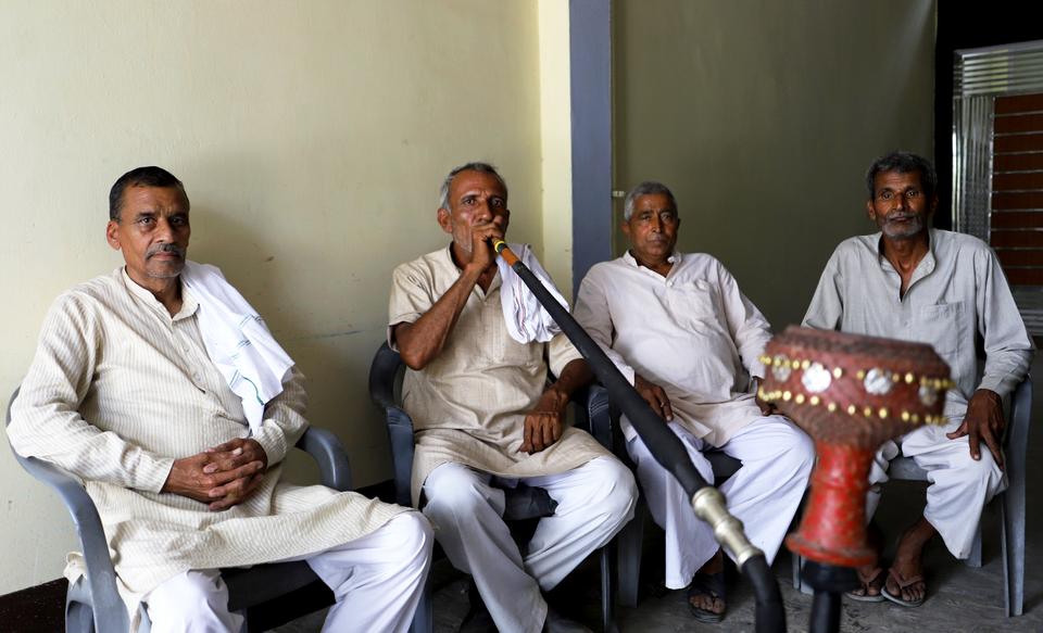 Rajbir Singh (first from the left), a Hindu Jat in Muzaffarnagar's Kakda town, says 