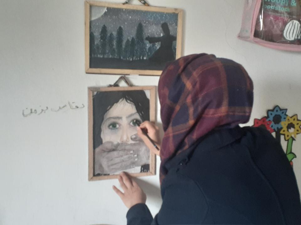 Amani Zankeh says her work depicts violence against Syrian women.