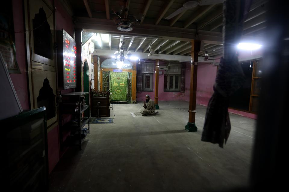 Muhammad Tahir Shah, a lone worshipper at a mosque in India-administered Kashmir.