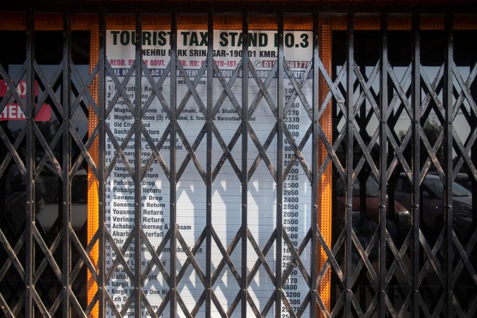 A taxi stand, never normally closed, is photographed shut near the Dal lake in Srinagar, Indian-controlled Kashmir, Tuesday, July 28, 2020.