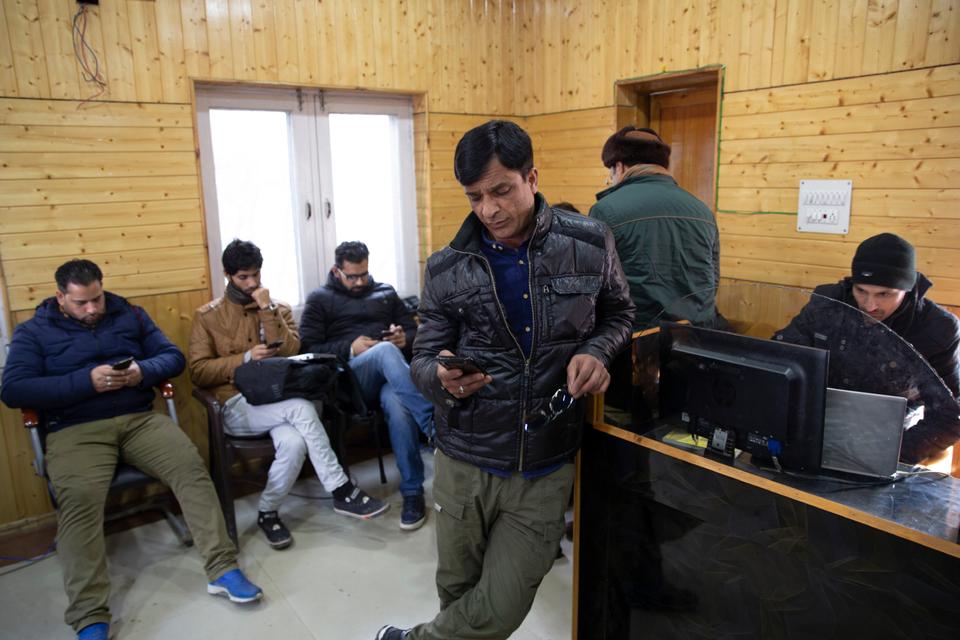 In this photo, shot on January 30, 2020, Kashmiri journalists browse the internet inside a media centre set up by government authorities in Srinagar, India-controlled Kashmir. The centre was the only place where journalists could access the internet for months amid an intense communication lockdown.