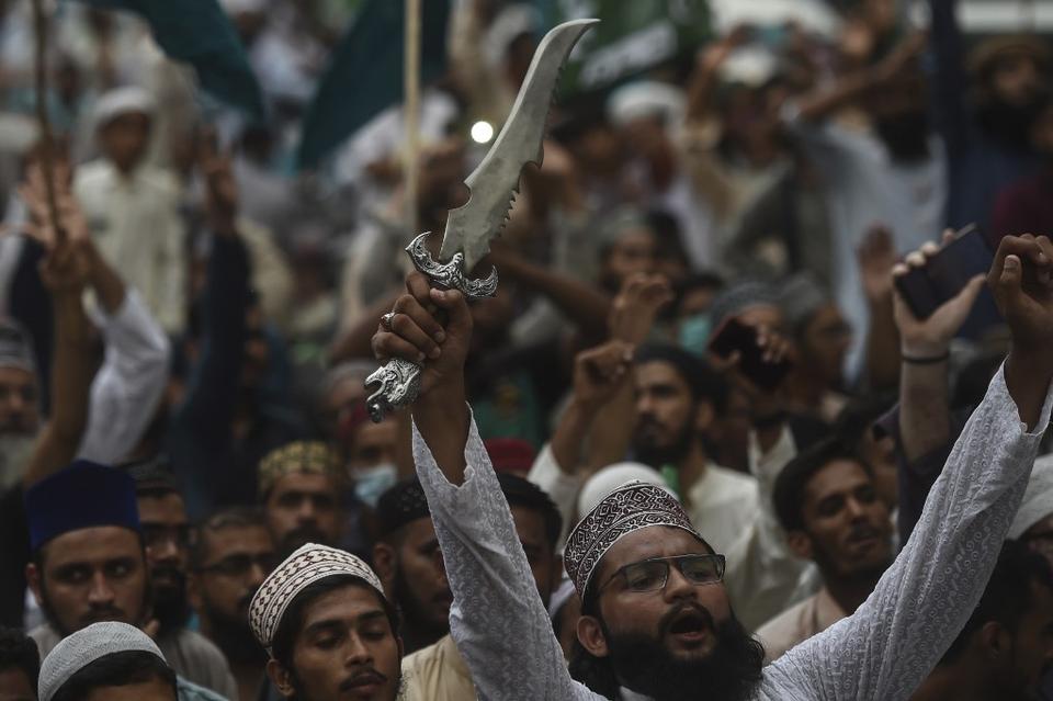 Supporters of hardline Tehreek-e-Labbaik Pakistan shout slogans during a protest in Karachi on September 4, 2020.