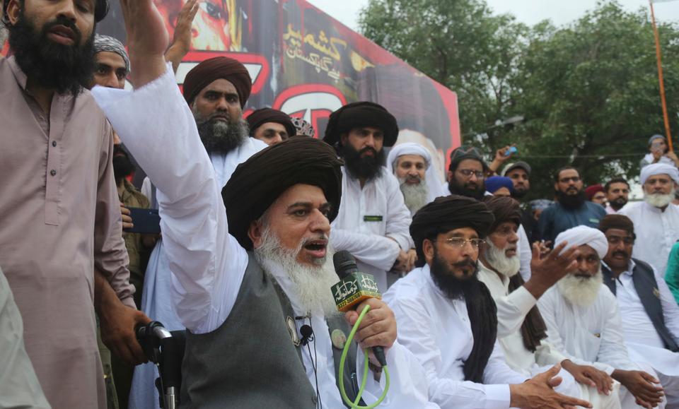 (File Photo) Pakistani radical cleric Khadim Hussain Rizvi addresses a rally against India in Lahore, Pakistan, Friday, Aug. 9, 2019. Thousands of activists held peaceful rallies across Pakistan to condemn India and its decisions on Kashmir.