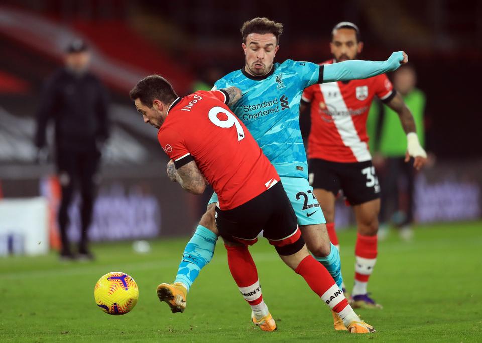 Liverpool's Xherdan Shaqiri in action with Southampton's Danny Ings Pool during a Premier League match in St Mary's Stadium, Southampton, Britain on January 4, 2021.